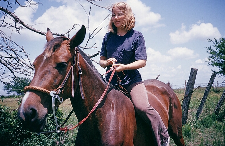 Catherine on Princess the horse, at the farm.