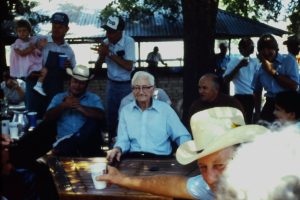 Ray Baca playing his hammer dulcimer at a feast in Fayetteville