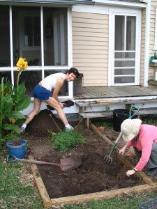 Stacy and I are planting a new flower bed.
