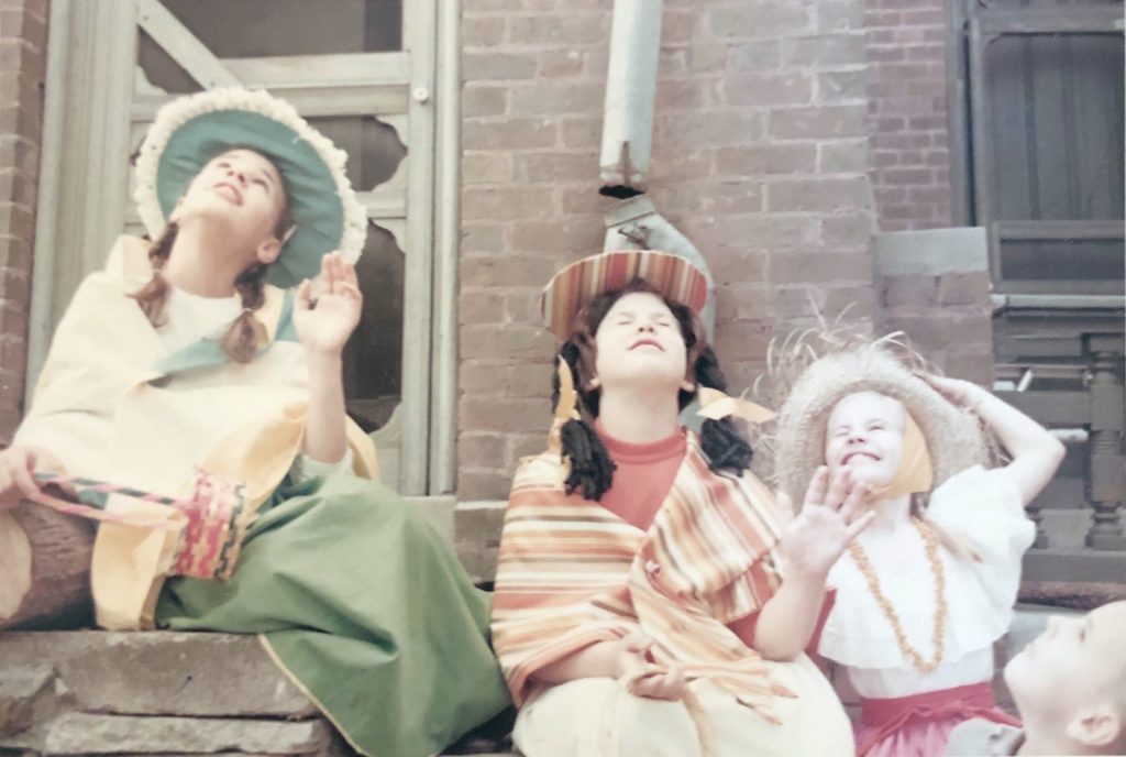 Wearing costumes outside the back door - Mary Elizabeth, Lynn N., Catherine