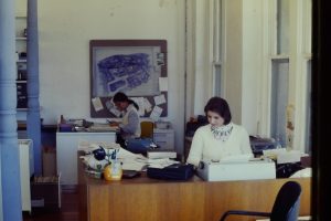 Clovis Heimsath Architect office in the Country Place Hotel building, 1976. Sheila at front desk, Maryann in back.