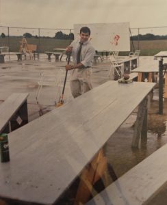 Sweeping the tennis court before Catherine’s wedding reception, 1986.